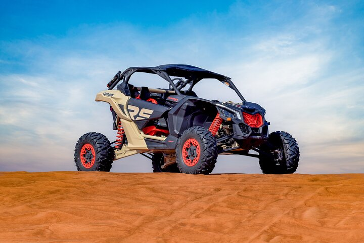 Experience the open desert of Dubai like never before. Explore stunning red dunes snap incredible photos and enjoy an unforgettable ride on the CAN-AM ATV. Adventure awaits!